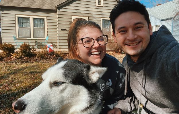 a couple and their dog enjoy life in Riverside, a neighborhood near downtown wichita